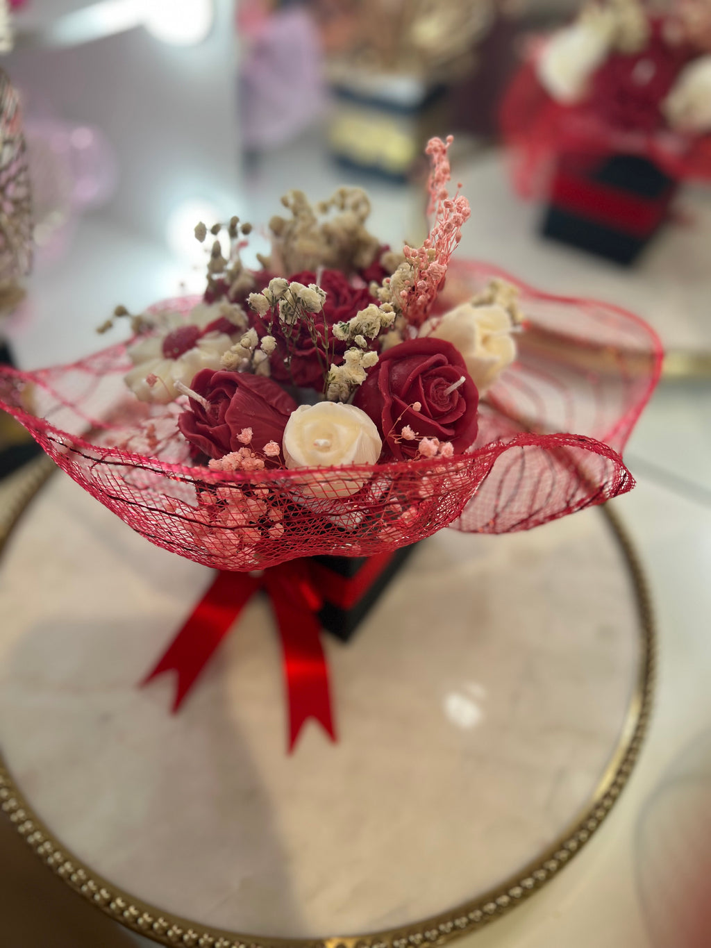 Candle flowers arrangement.